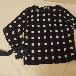 Long sleeve top, with ties at sleeve cuffs